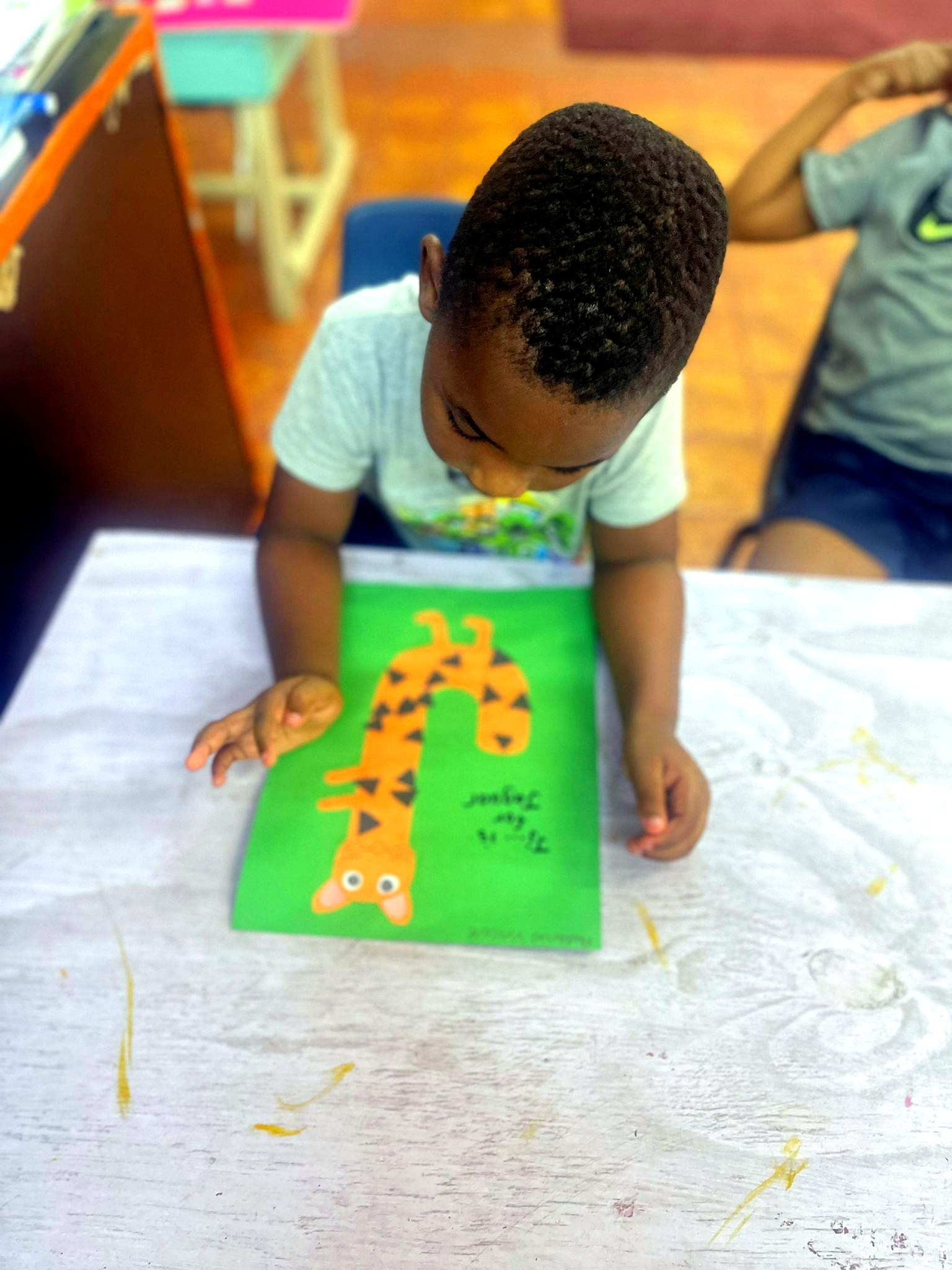 Student working on a classroom craft project